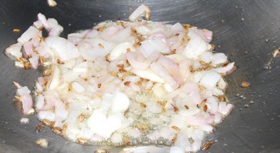 heat-oil-ghee-in-a-pan-add-onion-garlic-cumin-seeds.jpg
